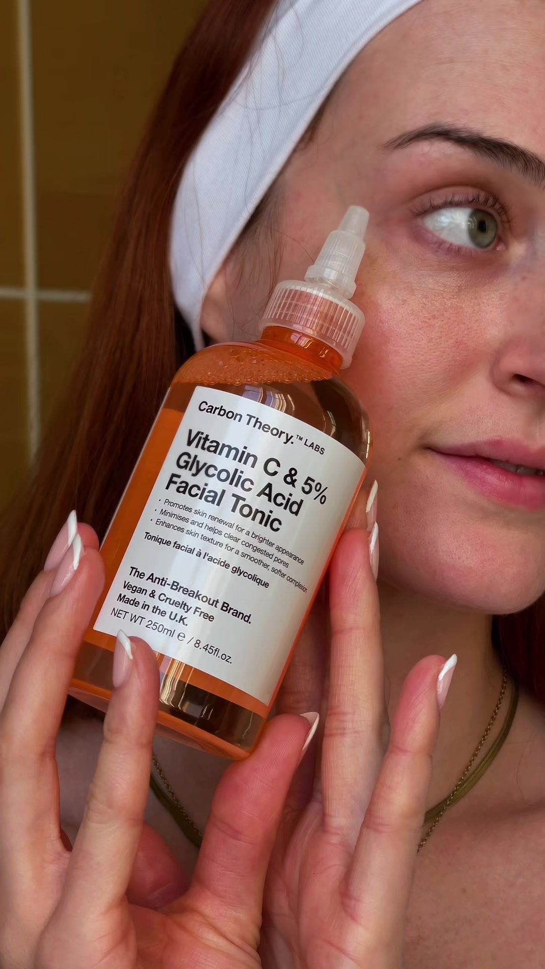 TikTok post by @theugcgirlie for Carbon Theory. Caption reads: SupaVIT-C - 5% Glycolic & Vitamin C Facial....