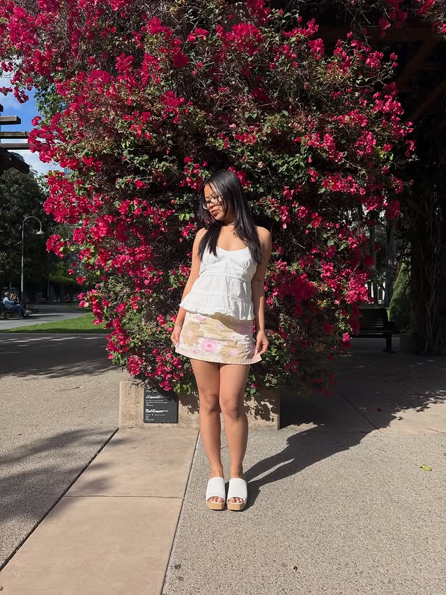 Instagram post by @tina.thi.dang for BEARPAW. Caption reads: Skipping into Spring with my new BEARPAW sandals!....