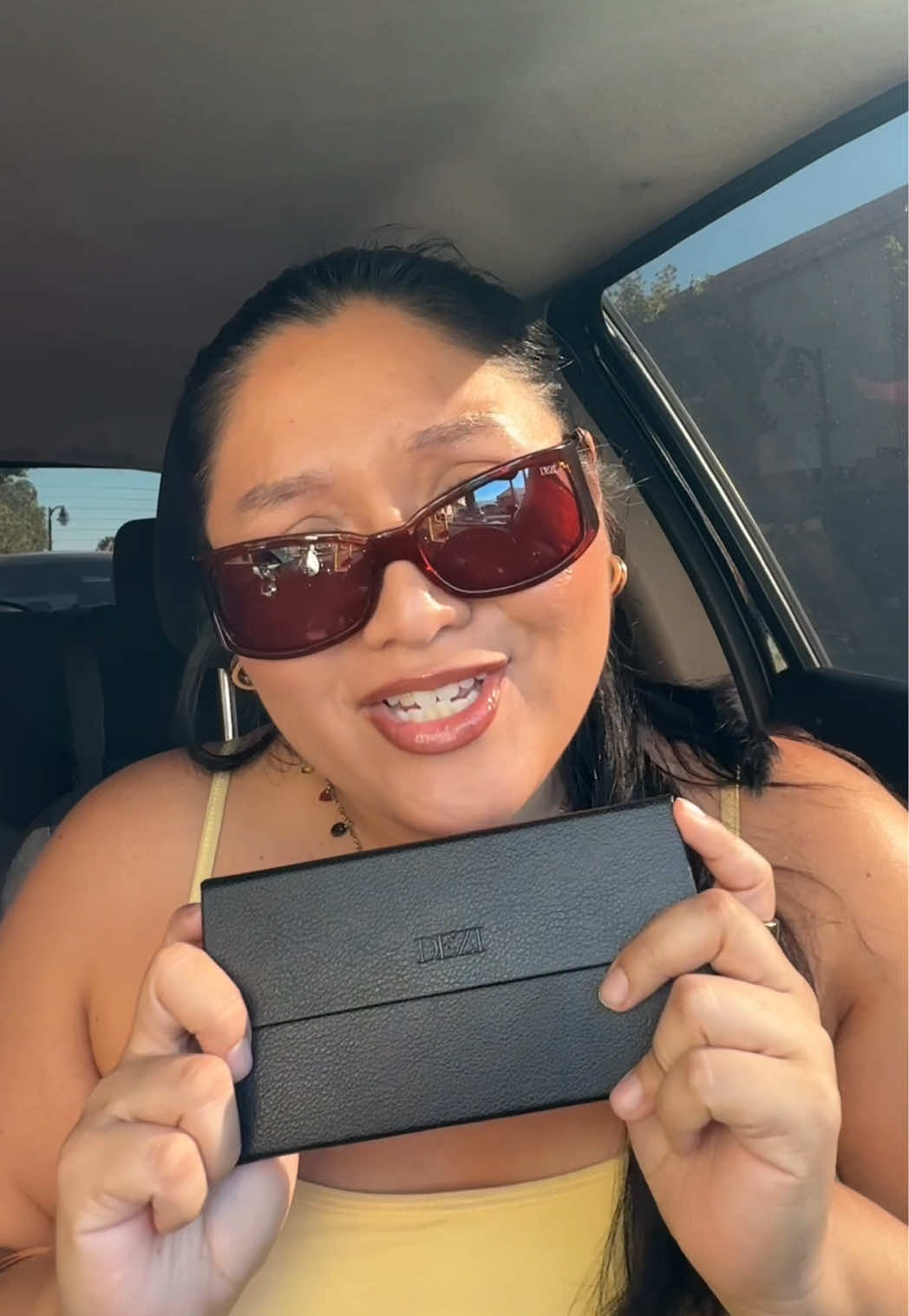 TikTok post by @lexielandy for DEZI. Caption reads: I love this feature & I love @DEZI EYEWEAR !!!....