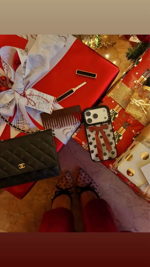 Instagram post by @emilythebearrr for CASETiFY. Caption reads: experiencing holiday magic in NYC with the most....