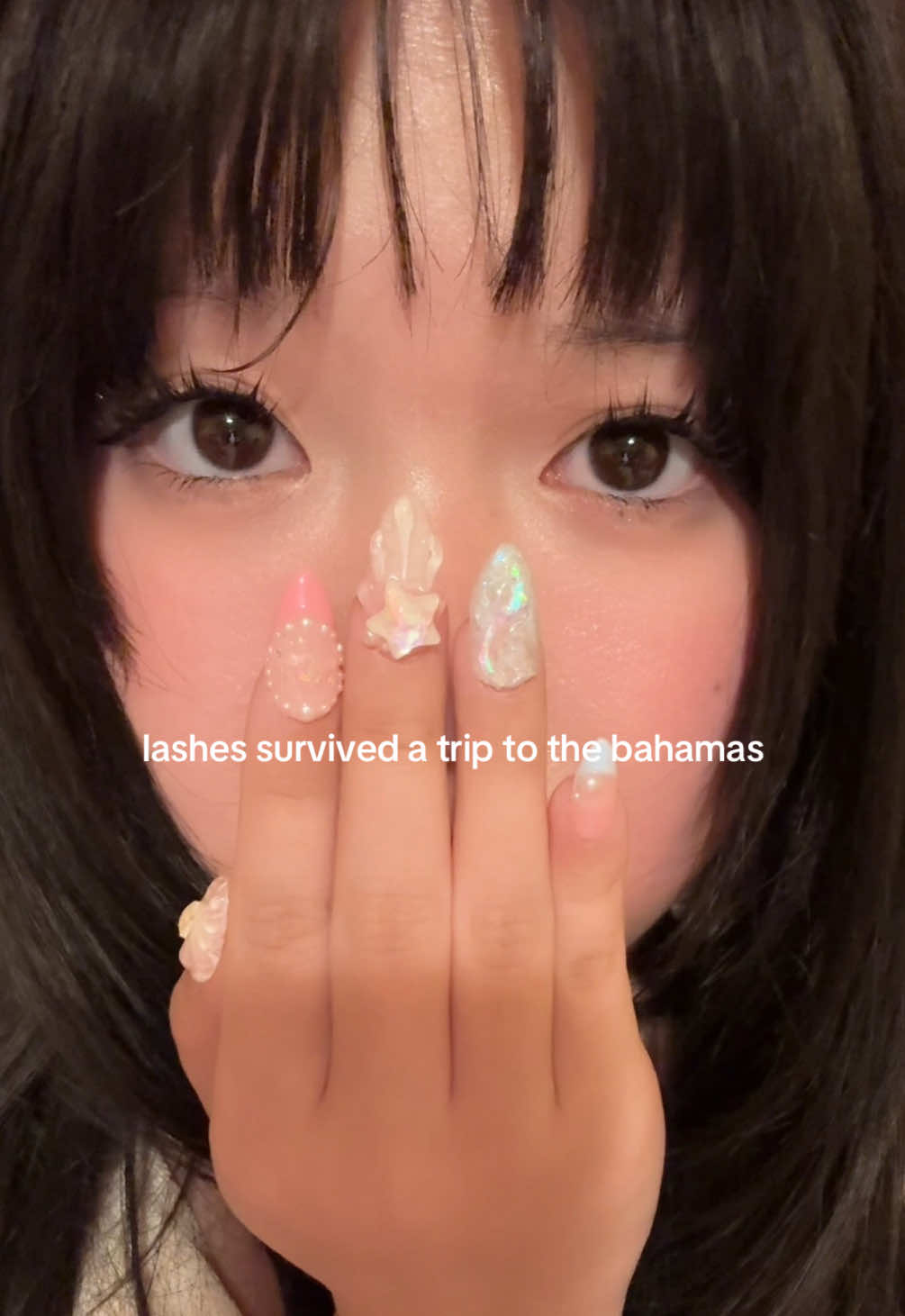 TikTok post by @elainesarchive for Fowendia Lashes. Caption reads: [...] but i was in the ocean everyday @Fowendia....