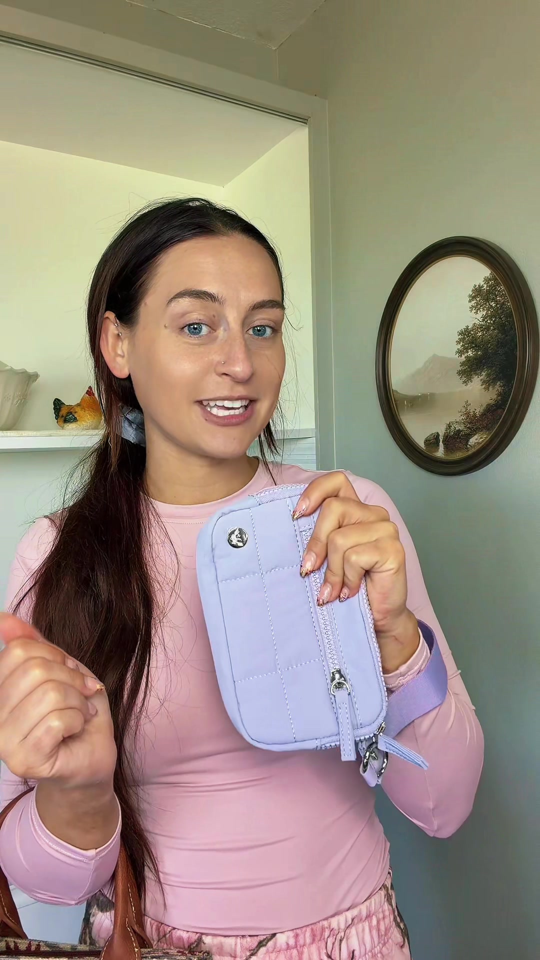 TikTok post by @livi.lou.2 for Westbronco. Caption reads: My little wristlet moment💜✨ @WESTBRONCO....