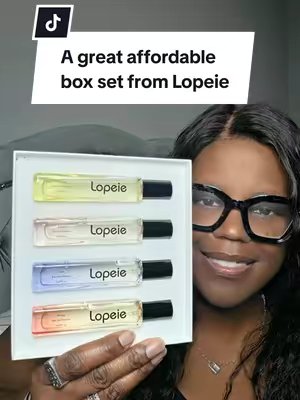 TikTok post by @msstacykodom for LOPEIE USA. Caption reads: [...] #perfumetiktok #perfumetok @LOPEIE USA.