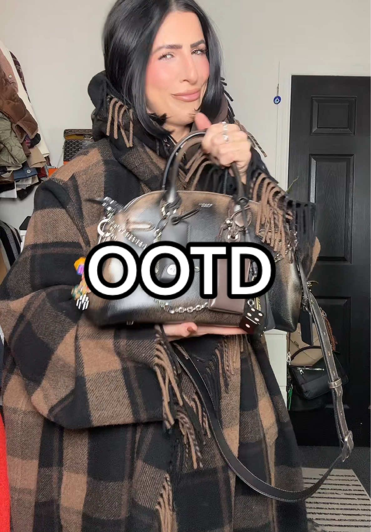 TikTok post by @nattythebratty for DEZI. Caption reads: OOTD 🖤🤎 @Coach @ZARA @DEZI EYEWEAR #ootd....