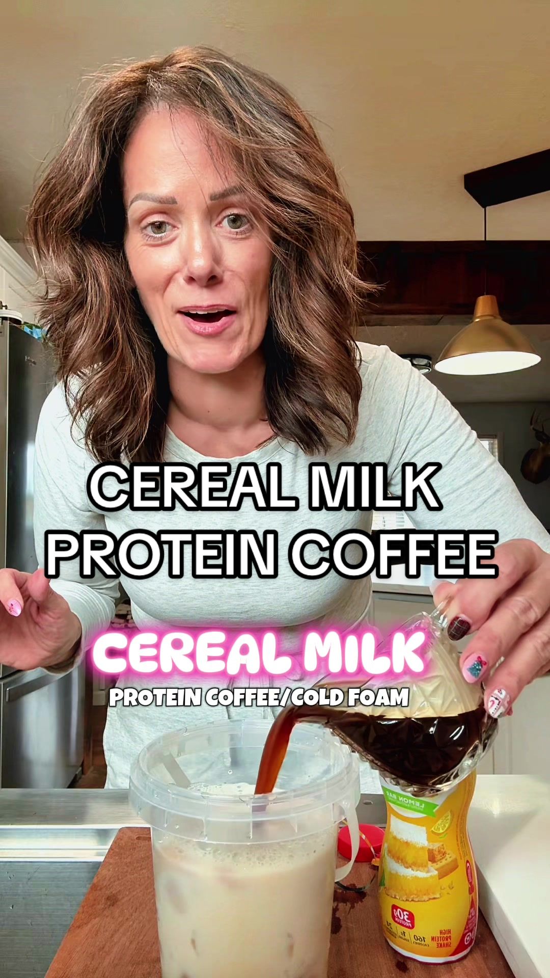 TikTok post by @takingmylifebackat42 for Skinny Mixes. Caption reads: 🍓🧋CEREAL MILK PROTEIN COFFEE….trust me on this.....