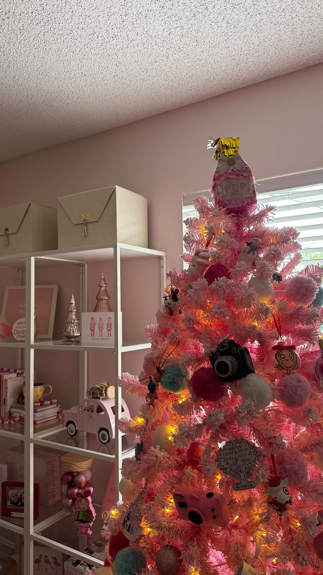 Instagram post by @themagicalmundanelife for King of Christmas. Caption reads: One last look at my beautiful, girly, pink tree....