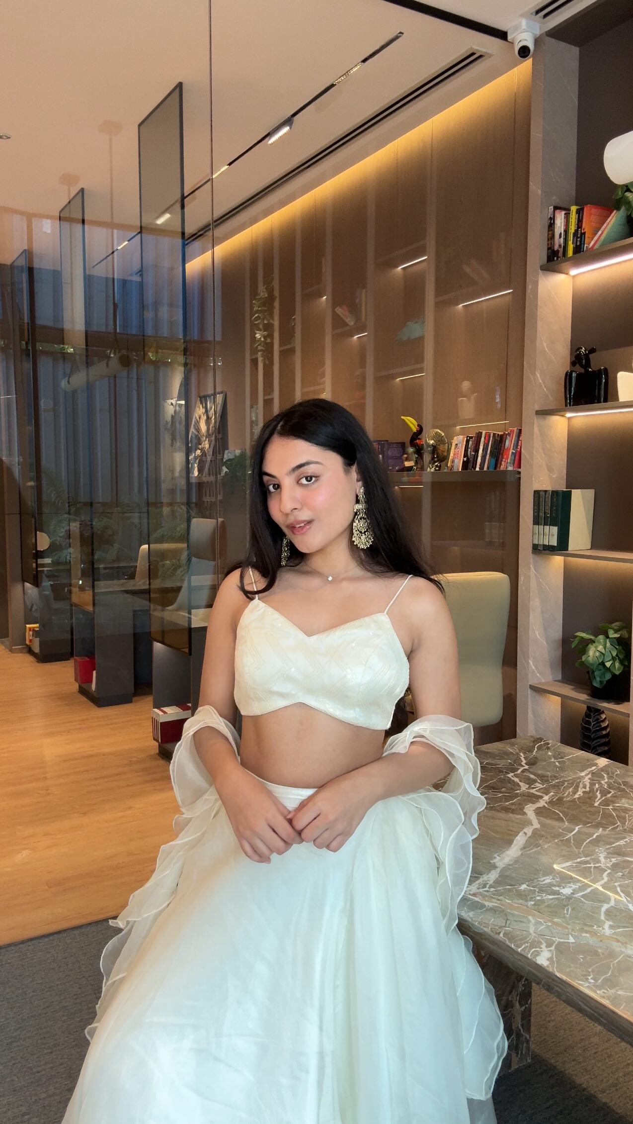 Instagram post by @asshnapunjabi for Wella. Caption reads: these are literally my go-to products while....