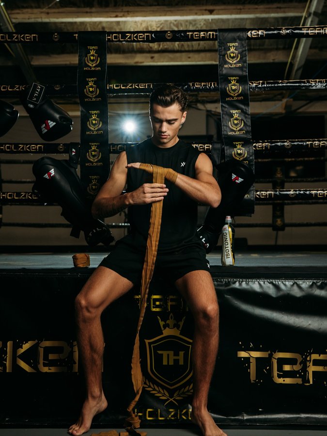 Instagram post by @geraldoholzken0 for XXL Nutrition. Caption reads: Every punch I throw is a promise to my future....