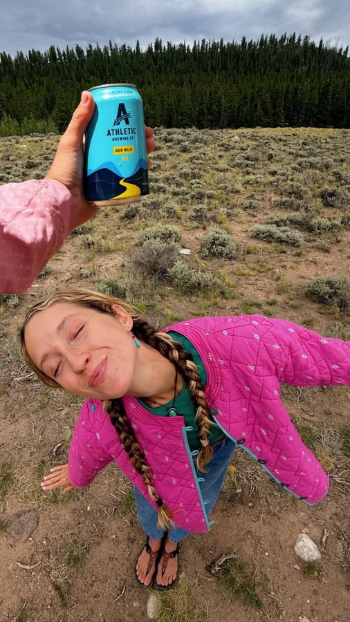 Instagram post by @teagan.maddux for Athletic Brewing. Caption reads: Me + @athleticbrewing = ultimate happiness 💕🫶🏼....