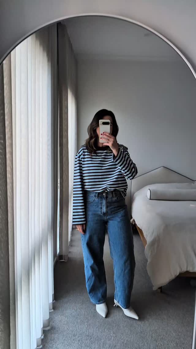 Instagram post by @sim.spys.stylist for Feather + Noise. Caption reads: OKAY..I'm obsessed. Aggressive music for a knit....