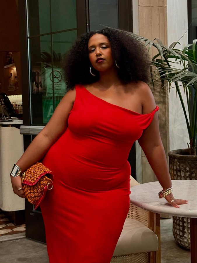 Instagram post by @lookingforlids for REBDOLLS. Caption reads: i’ll pick a red dress every time 🥰....