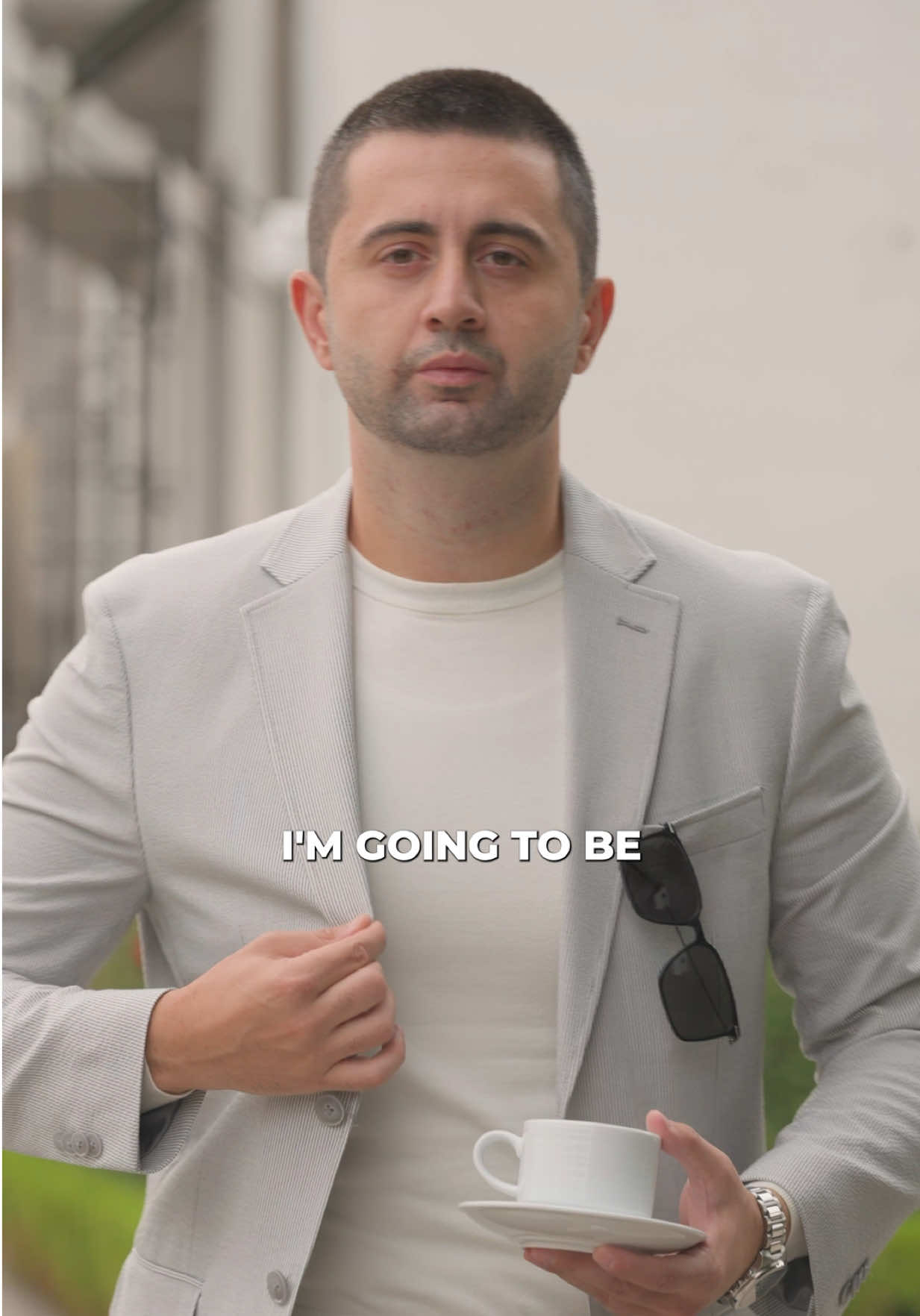 TikTok post by @realnealkennedy for Perry Ellis. Caption reads: @Perry Ellis enhances my confidence off the field....