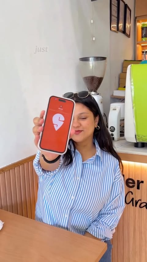 Instagram post by @foodieebaee for Swiggy Dineout. Caption reads: [...] ☕😋 @swiggy_dineout @abcoffeeindia Swiggy....