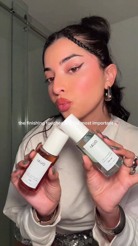 Instagram post by @miammarquez for OUAI. Caption reads: @theouai Ibiza and Santorini Mists smell like....
