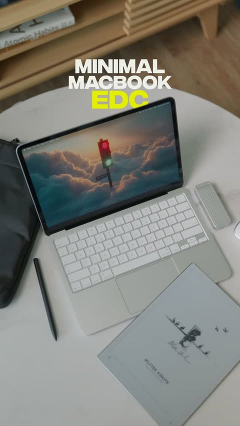 Instagram post by @mikebanh_ for Tomtoc. Caption reads: My Minimal MacBook Everyday Carry @tomtoc_official....