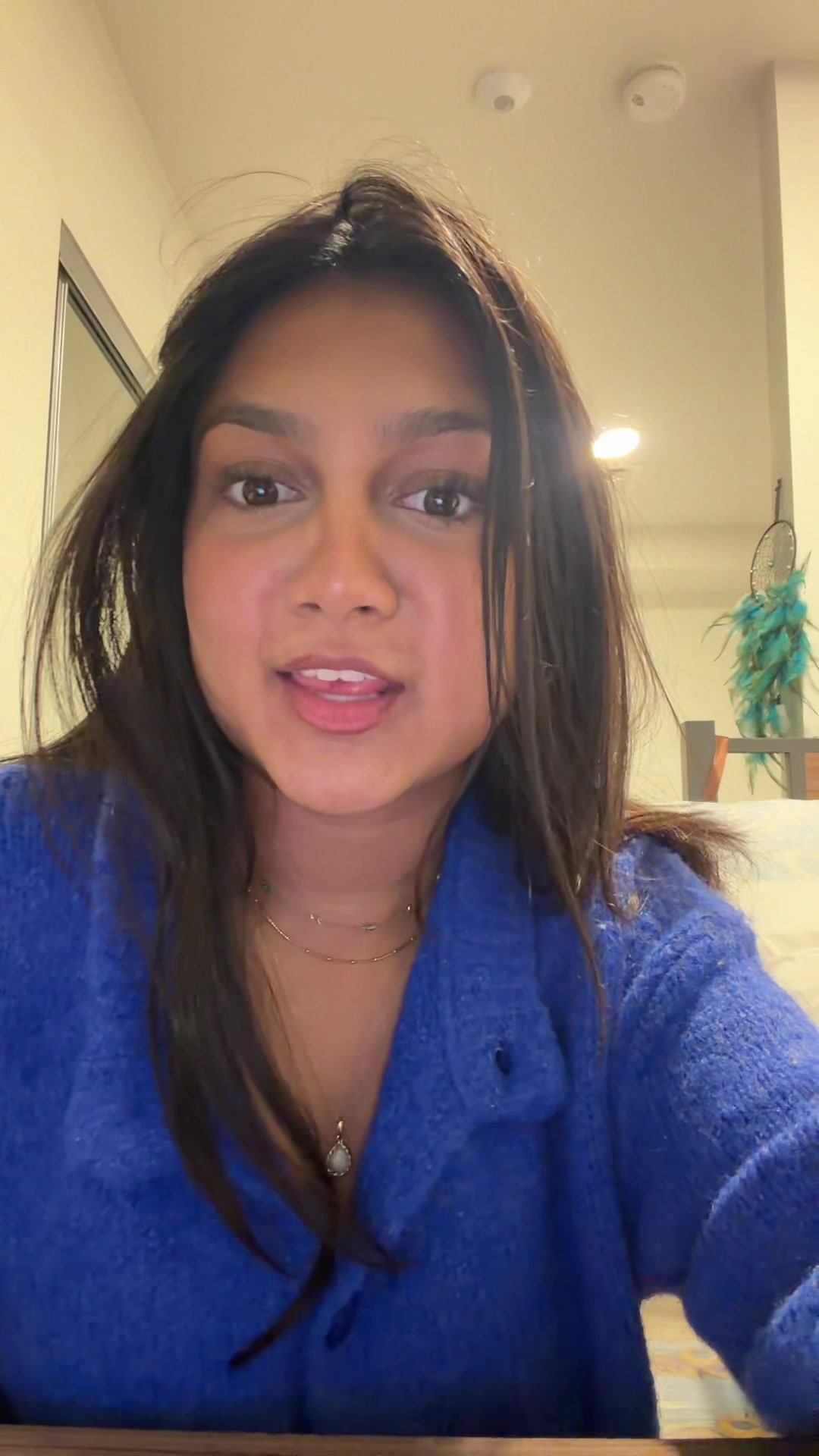 TikTok post by @sheesh_kabob._ for Her Campus. Caption reads: socks + slippers ofc @hercampus @OOFOS #TeamOOFOS....