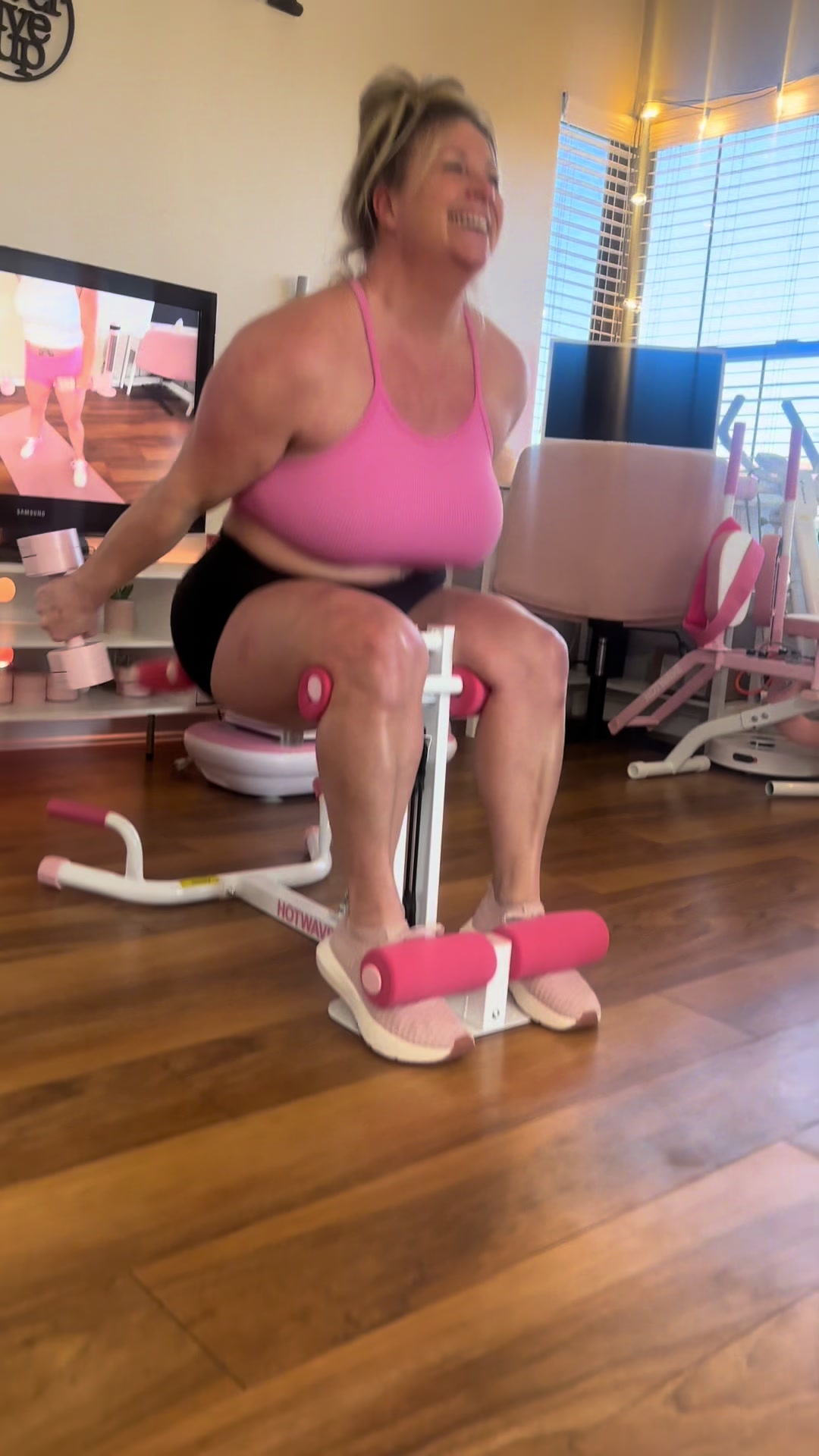 TikTok post by @pinkafgirl for Hotwave. Caption reads: [...] with this PINK deep squat machine by....