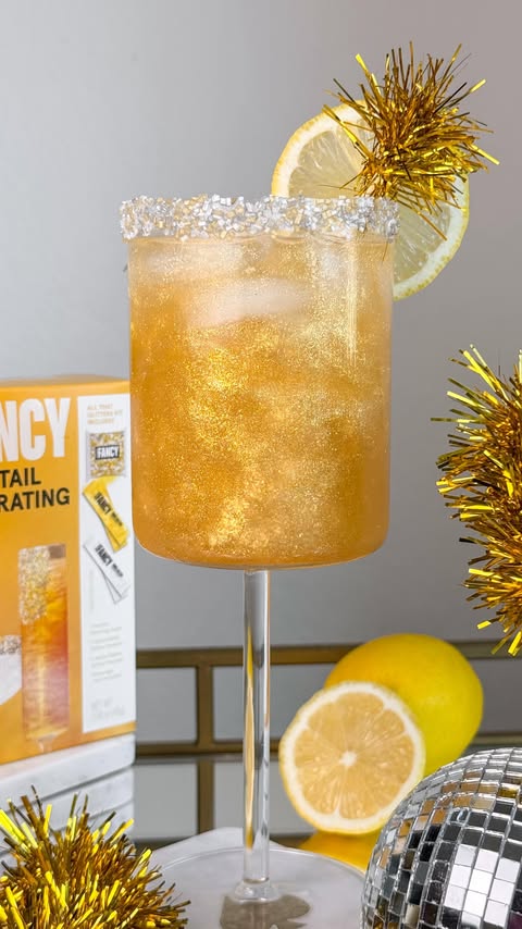 Instagram post by @thespritzeffect for Fancy Sprinkles. Caption reads: New Year’s Eve Sparkling Spritz! ✨🎇🥂

Ring in....