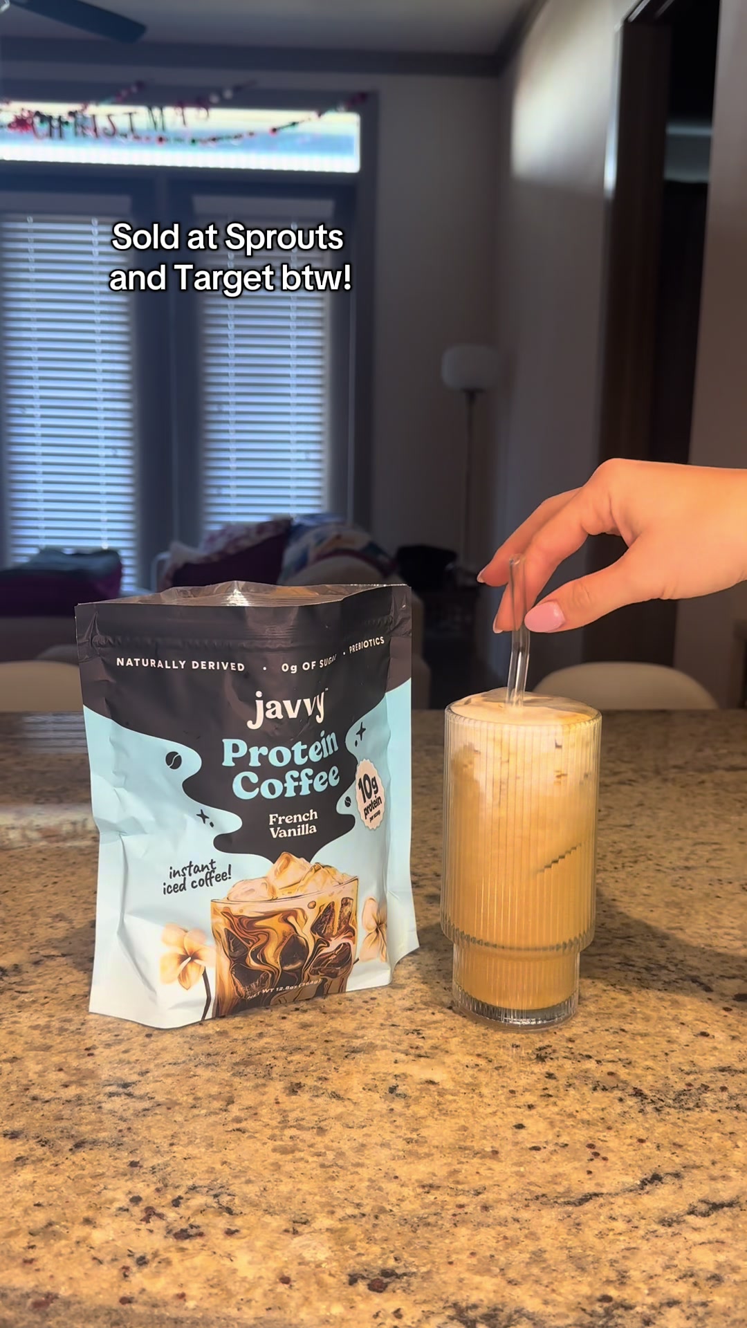 TikTok post by @trinitytmiles for Javy Coffee. Caption reads: Adding @Javvy Coffee to my morning routine! ⛅️💪☕️....