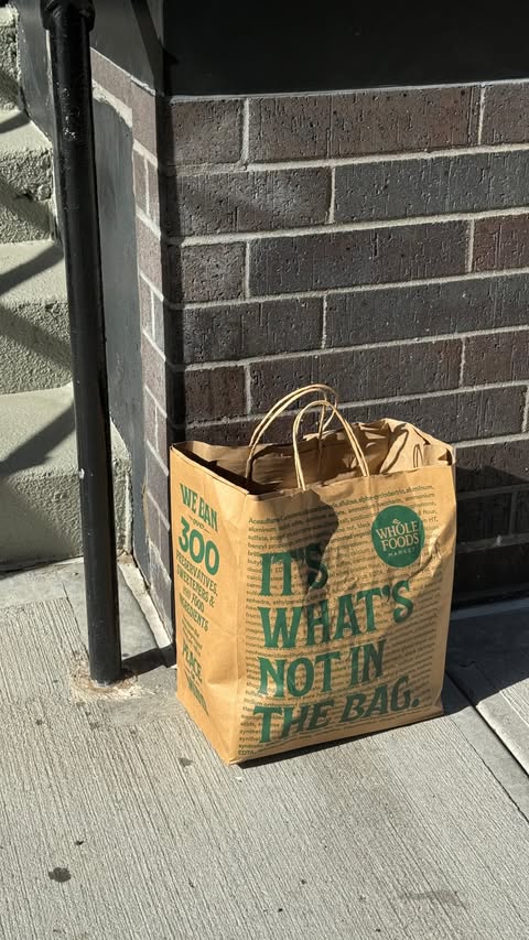 Instagram post by @clairethenutritionist for Whole Foods Market. Caption reads: come restock my fridge w/ me at @wholefoods after....