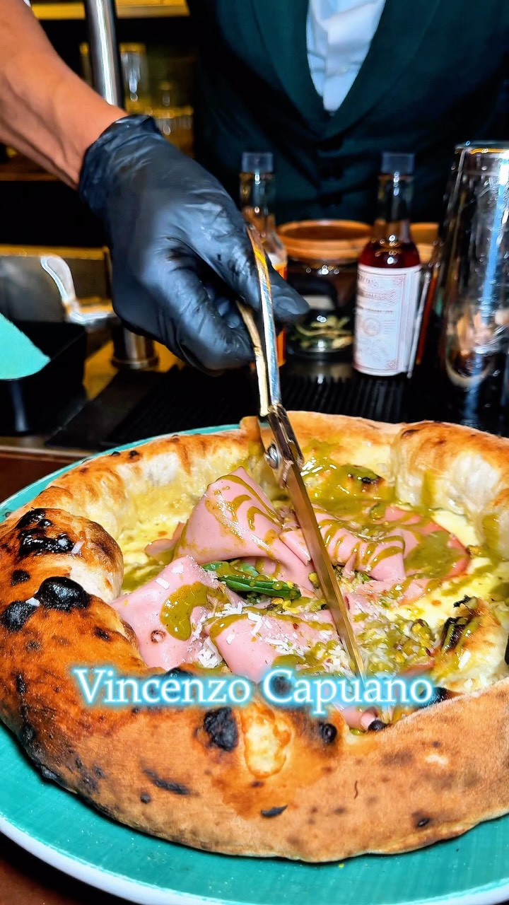 Instagram post by @wantwoeatsg for VisitSingapore. Caption reads: 🍕 Would you take a bite of Napoli in Singapore at....