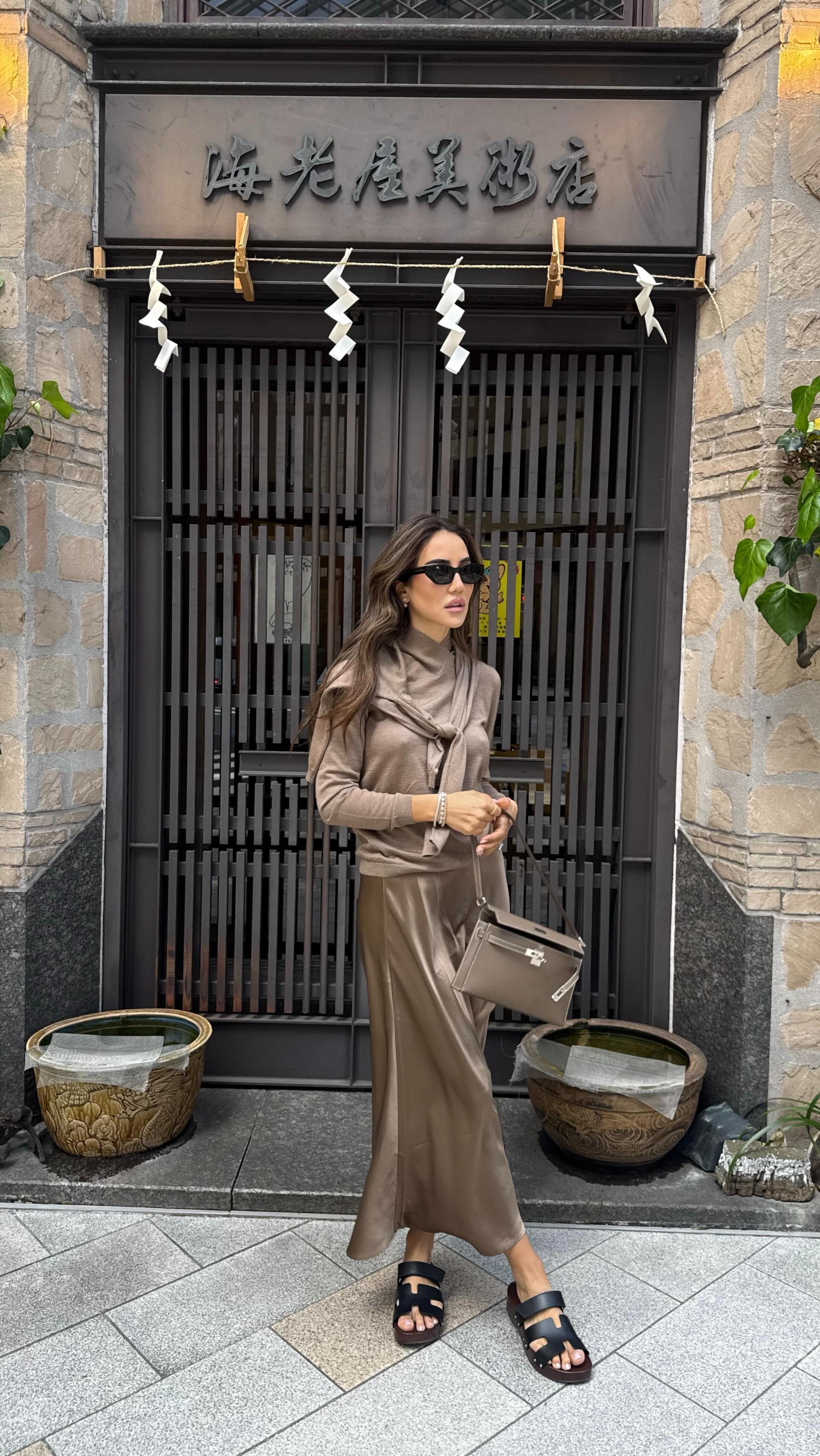 Instagram post by @tamara for Falconeri. Caption reads: When packing only bringing things that are....