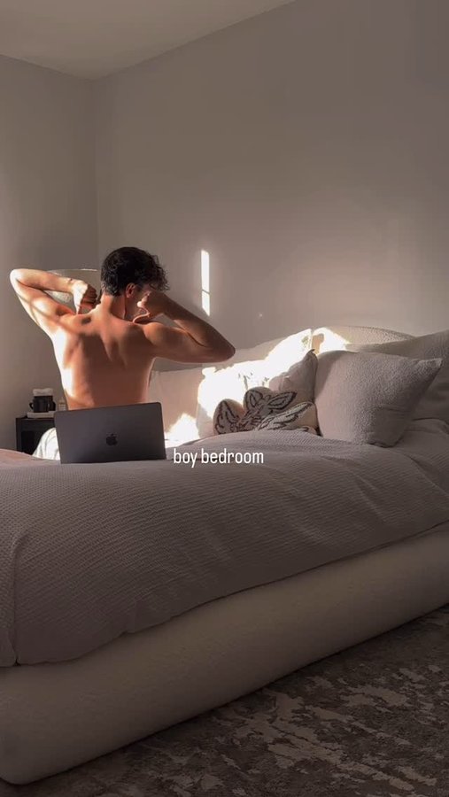 Instagram post by @noahmujalli for Softframe Designs. Caption reads: My monochrome bouclé boy bedroom ☁️....