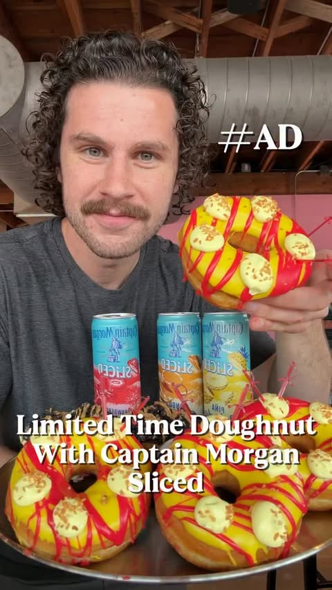Instagram post by @thedaviddouglass for Captain Morgan. Caption reads: @captainmorganusa and @voodoodoughnut collab! #ad....