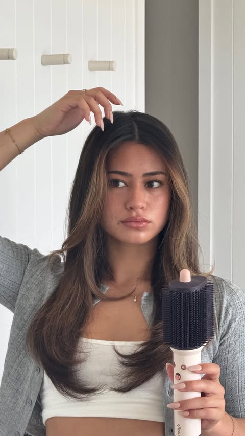 Instagram post by @aliyaarawle for Dyson. Caption reads: I’ve been using the @dyson_anz for the perfect....