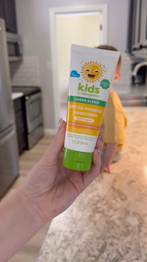 Instagram post by @lillynbelle for babyganics. Caption reads: 🌞 staying protected all summer with @babyganics....