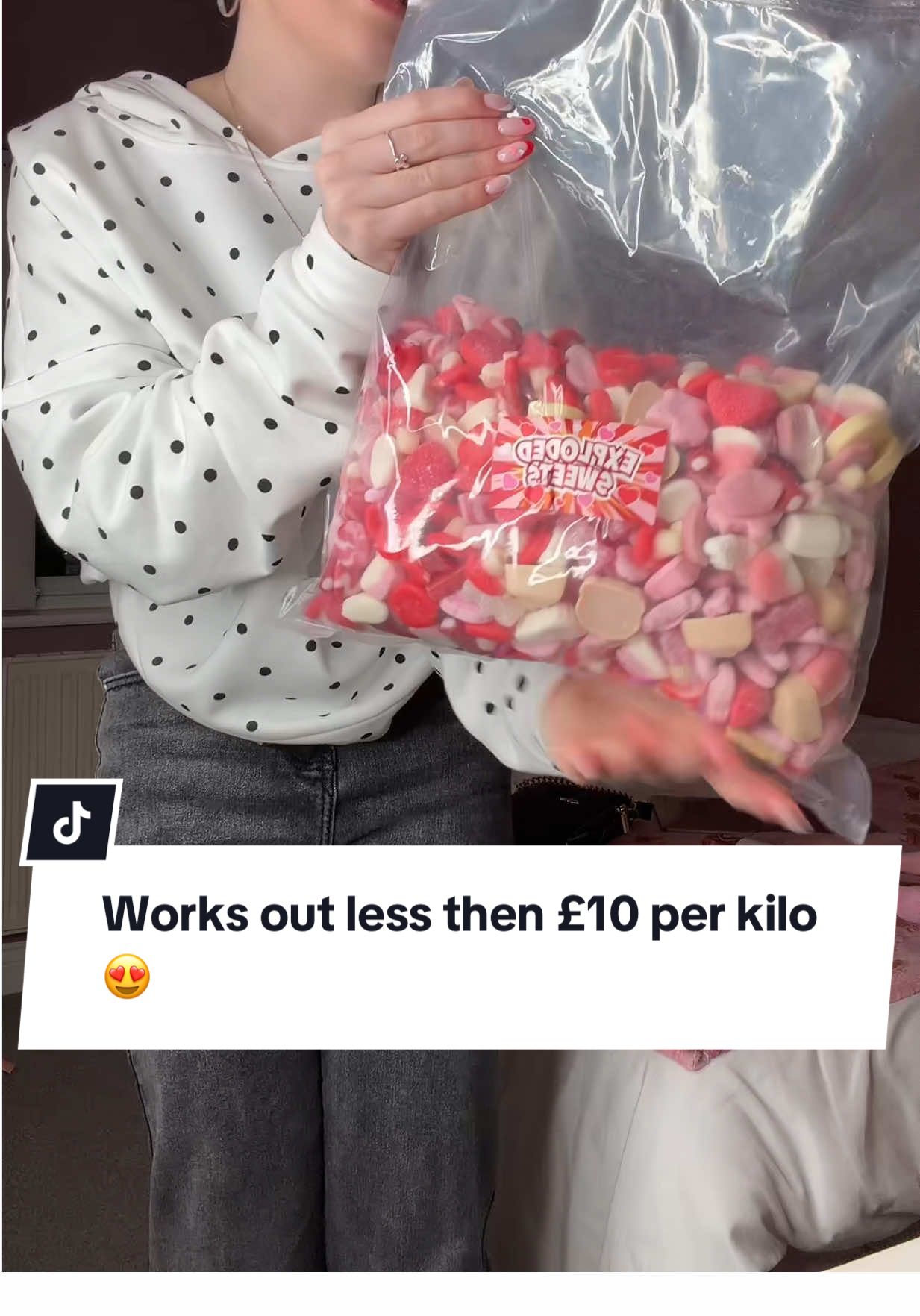 TikTok post by @_maddie.fry_ for Exploded Sweets. Caption reads: Works out less then £10 for a kilo @Exploded....