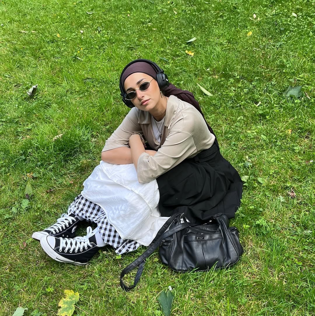 Instagram post by @nadine__el for Schuh. Caption reads: Converse are really for every occasion; festivals,....