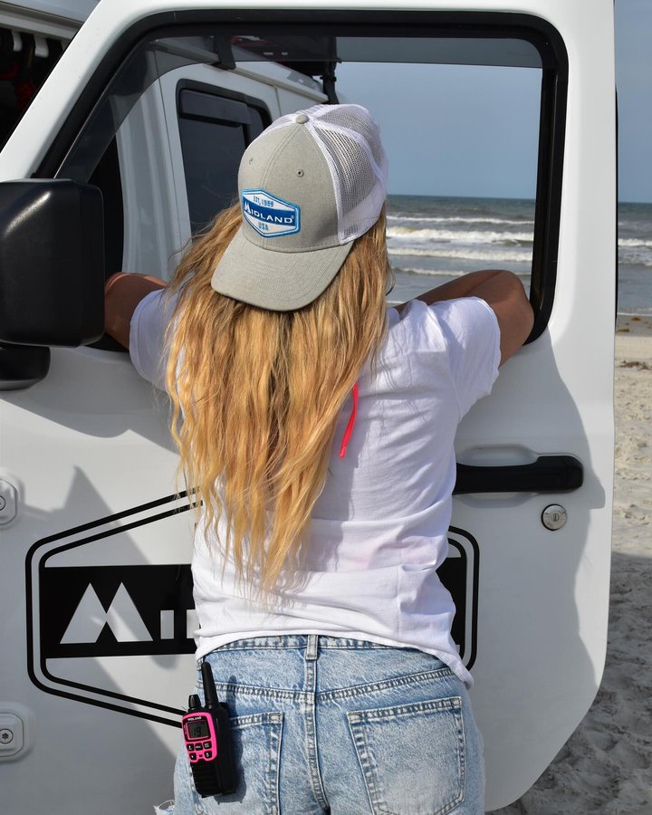 Instagram post by @jeepdaisy for Midland Radio. Caption reads: Geared up and ready at Jeep Beach with....