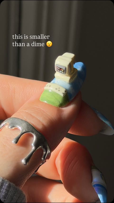 Instagram post by @thegraytergood for Windows. Caption reads: #ad // hellooooo 3D mini nails for @windows !!....