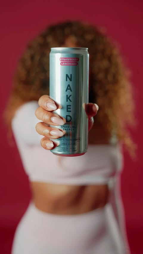 Instagram post by @suzette_james for Naked Nutrition. Caption reads: [...] lit and tasting like summer ☀️🍓🍋....
