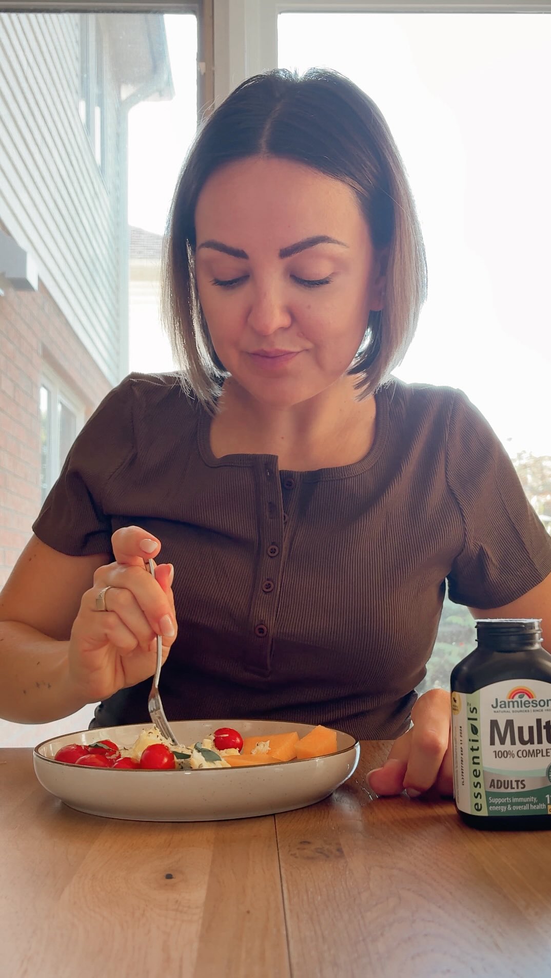 Instagram post by @confidentiallykatie for Jamieson Vitamins. Caption reads: One thing I never forget? My @jamiesoncanada 100%....