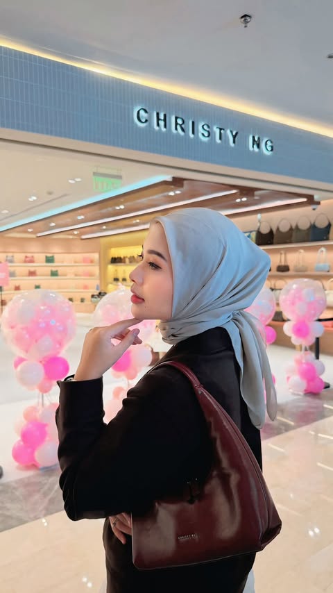 Instagram post by @alyaalfiunna_ for Christy Ng. Caption reads: ChristyNG is now open at Puri Indah Mall 1✨ [...].