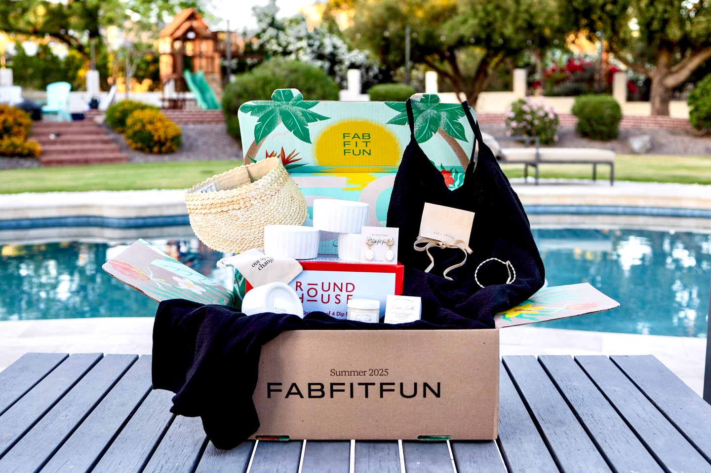 Instagram post by @mommy_view for FabFitFun. Caption reads: #AD ☀️ Summer days here I come!

I just unboxing....