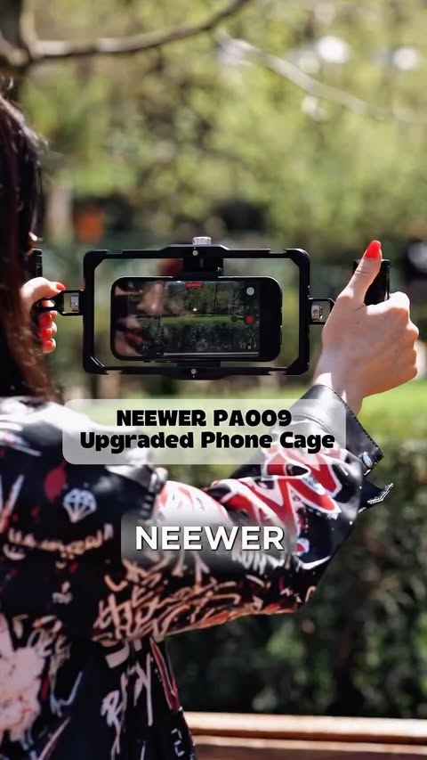 Instagram post by @anuki_anna_ for NEEWER. Caption reads: NEEWER PA009 Upgraded Phone Cage @neewer 🤍✨.