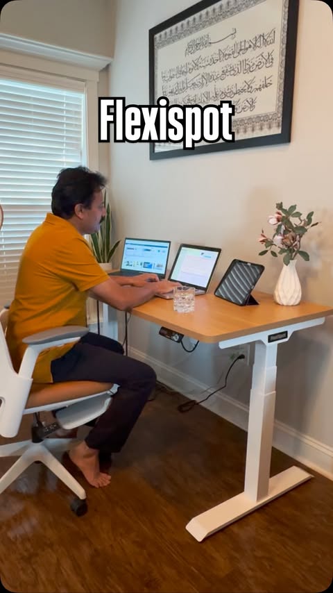 Instagram post by @mqsfreebies for FlexiSpot. Caption reads: [...] completely changed our workday. 🙌....