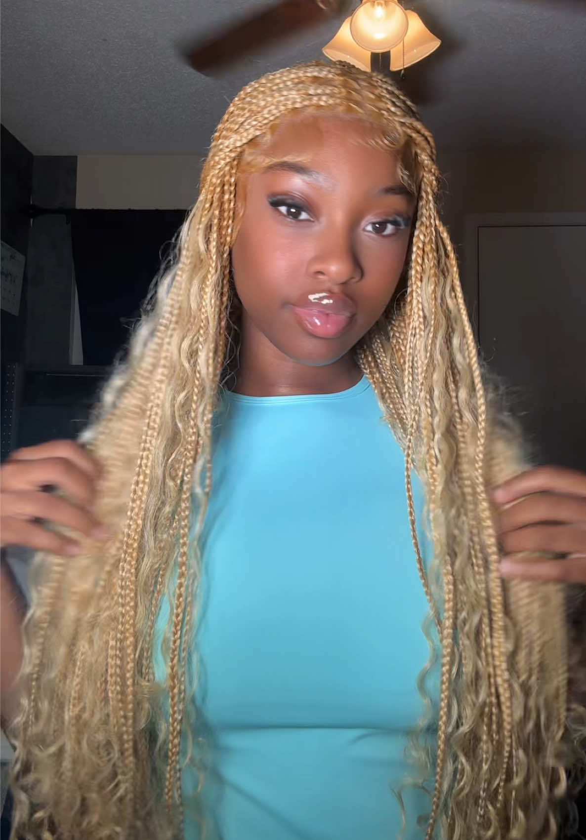 TikTok post by @itsshaniya_ for Supernova Hair. Caption reads: [...] 🧡✨ these boho braids ateee 😍 from....
