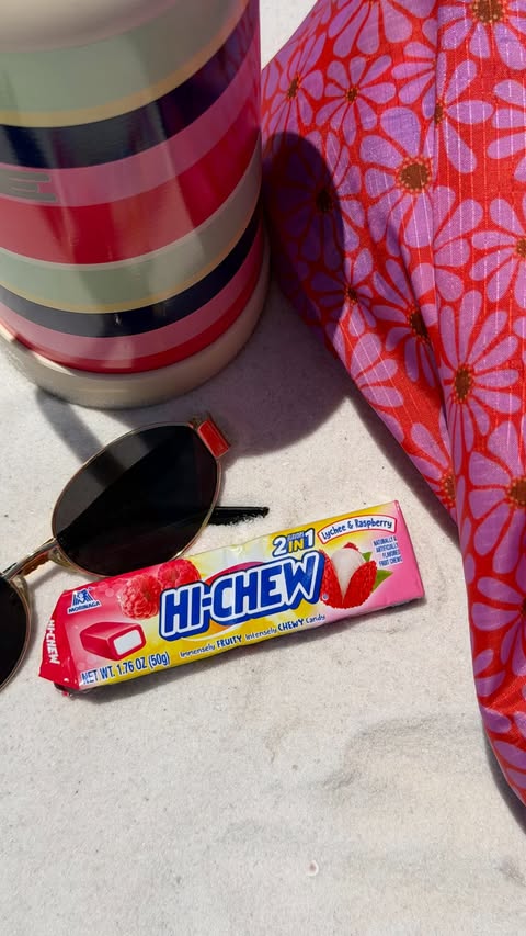 Instagram post by @haileighangelle for HI-CHEW. Caption reads: [...] beach day & sweet treat season 💖🌺....