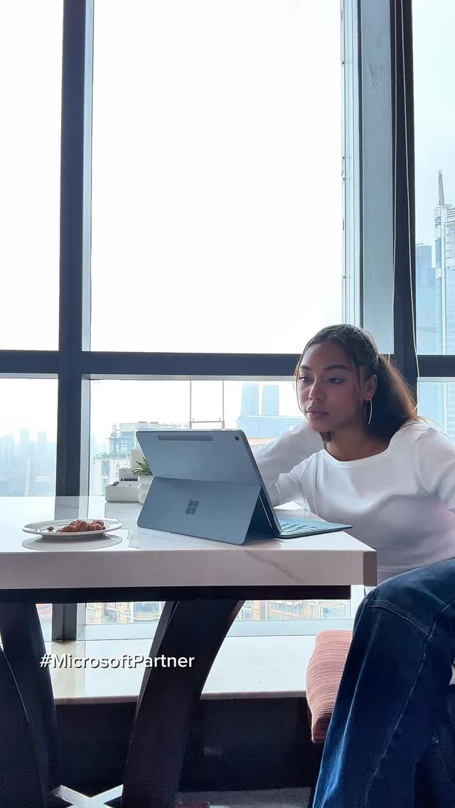 Instagram post by @margzetta for Microsoft Surface. Caption reads: #MicrosoftPartner From class, to practice, to meet....