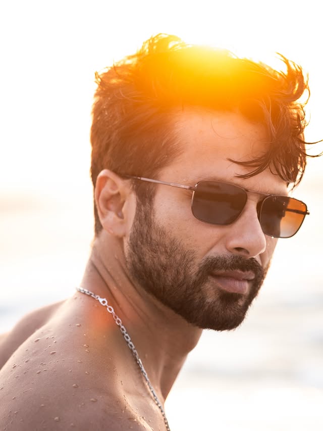 Instagram post by @shahidkapoor for Vogue Eyewear. Caption reads: [...] out, shades on, mood sorted ☀️🕶️....