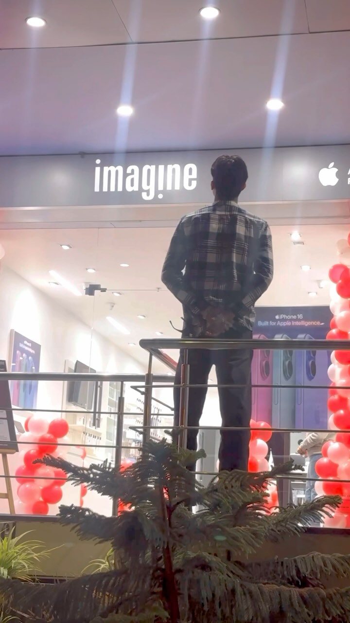 Instagram post by @amit.kash for Imagine Apple Premium Partner. Caption reads: #ad @imagineapplepr 

#NewYearOffersAtImagine 🎉....