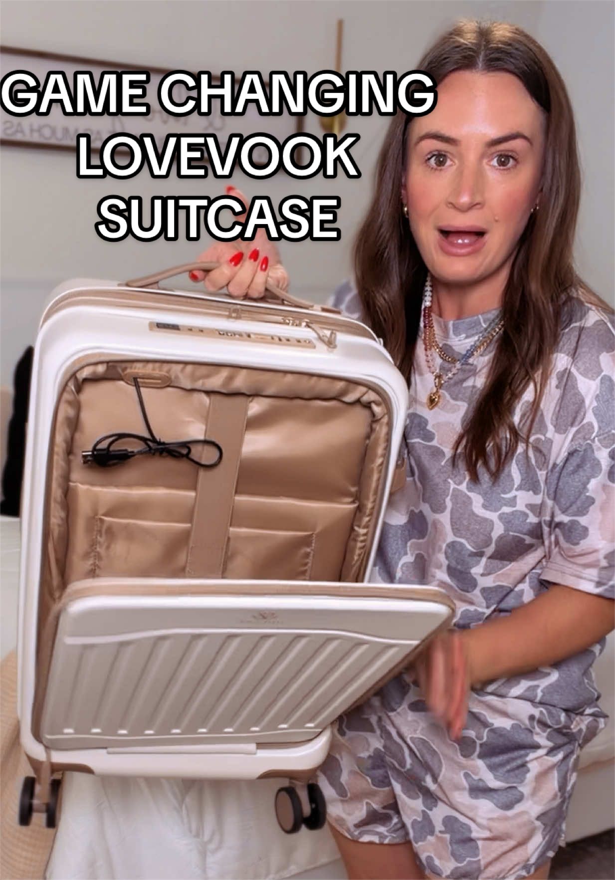 TikTok post by @bpeck26 for Lovevook. Caption reads: #luggage #suitcase #travel #lovevook....