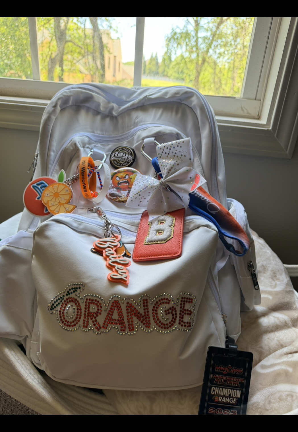 TikTok post by @johnsonnbaileyy for Varsity Spirit. Caption reads: [...] stuff into my new bag!! thank you @Varsity....
