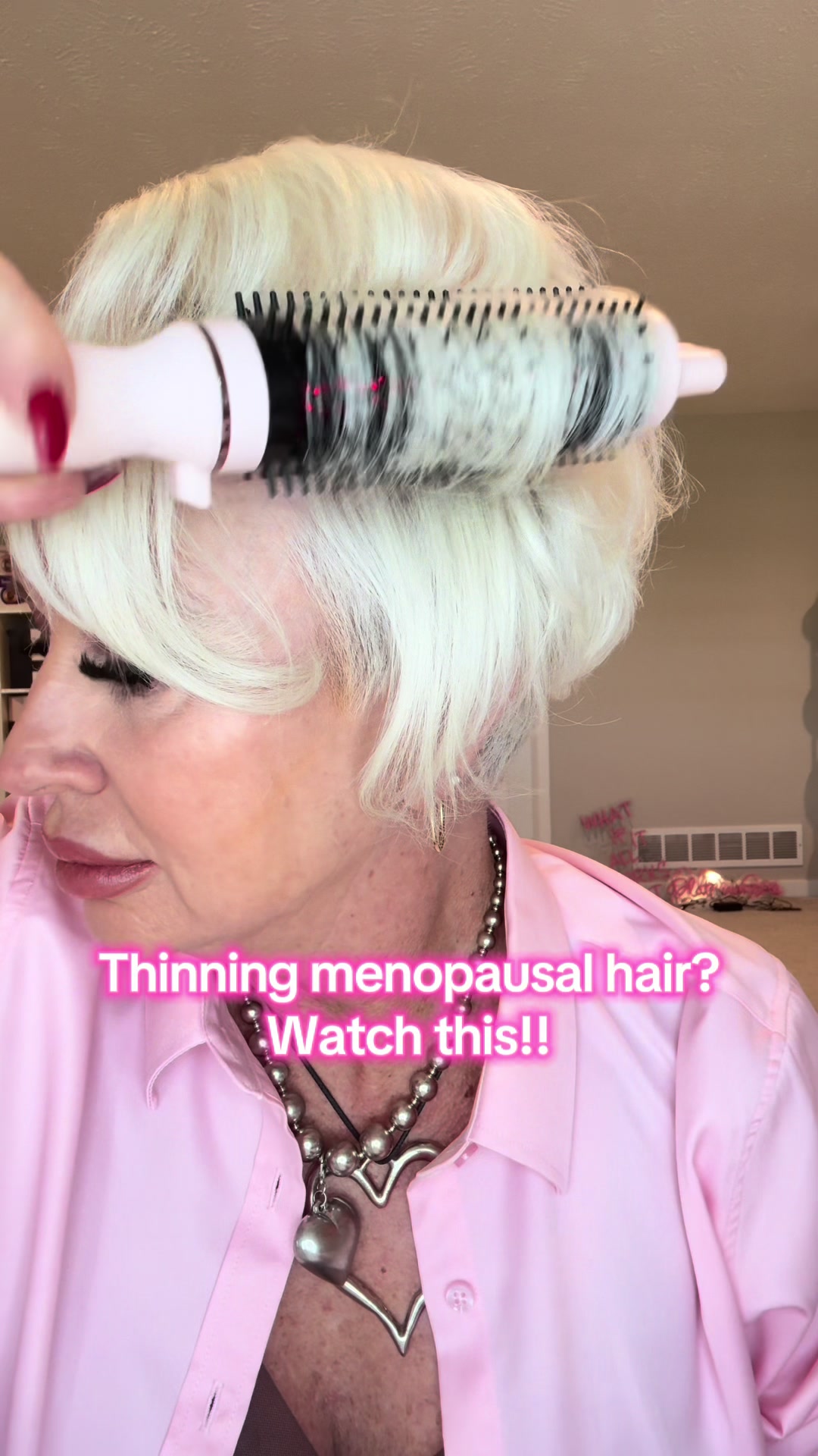 TikTok post by @theplatinumsass for L’ange Hair. Caption reads: [...] #HairVolumeHack @langehair.