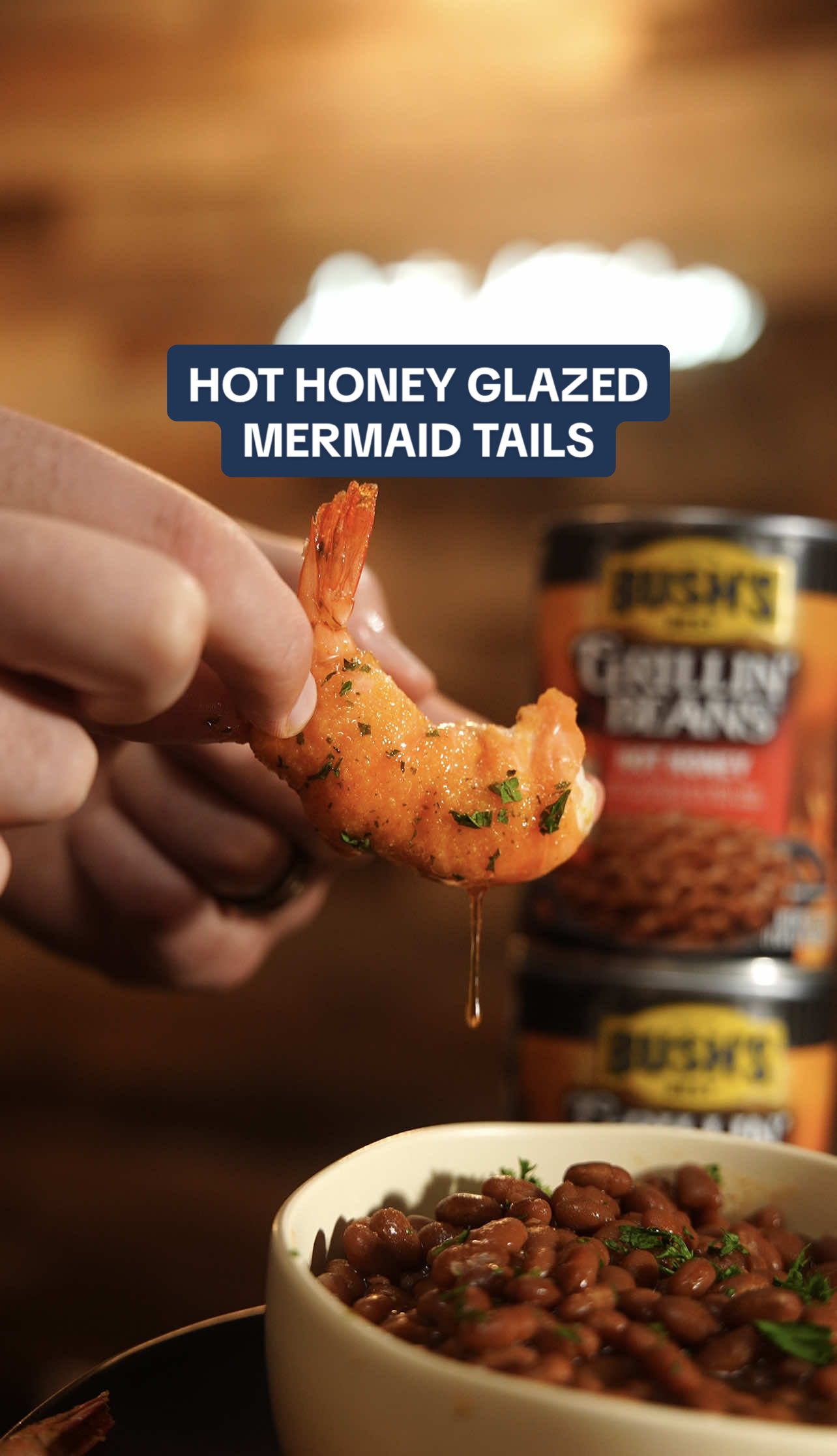 TikTok post by @jortskitchen for Mike's Hot Honey. Caption reads: #BushsBeansPartner Hot-Honey Mermaid Tails paired....