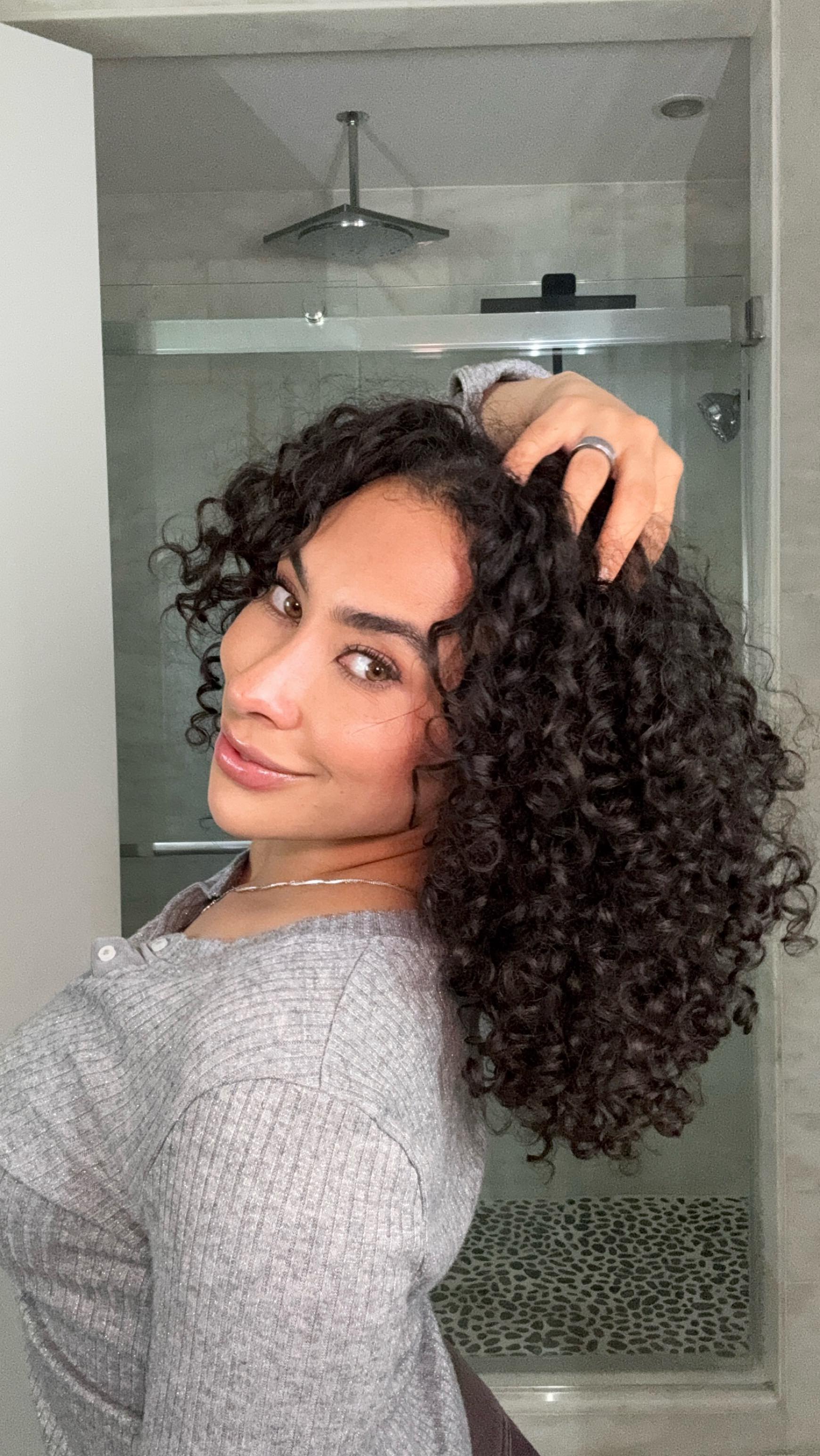 Instagram post by @pilatesbodyraven for Cantu Beauty. Caption reads: Here’s how I saved $200 in one wash day! I’m SO....